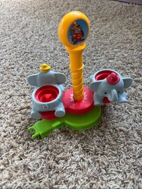 Fisher-Price Little People Disney Dumbo Spinning Elephants Ride toy.
